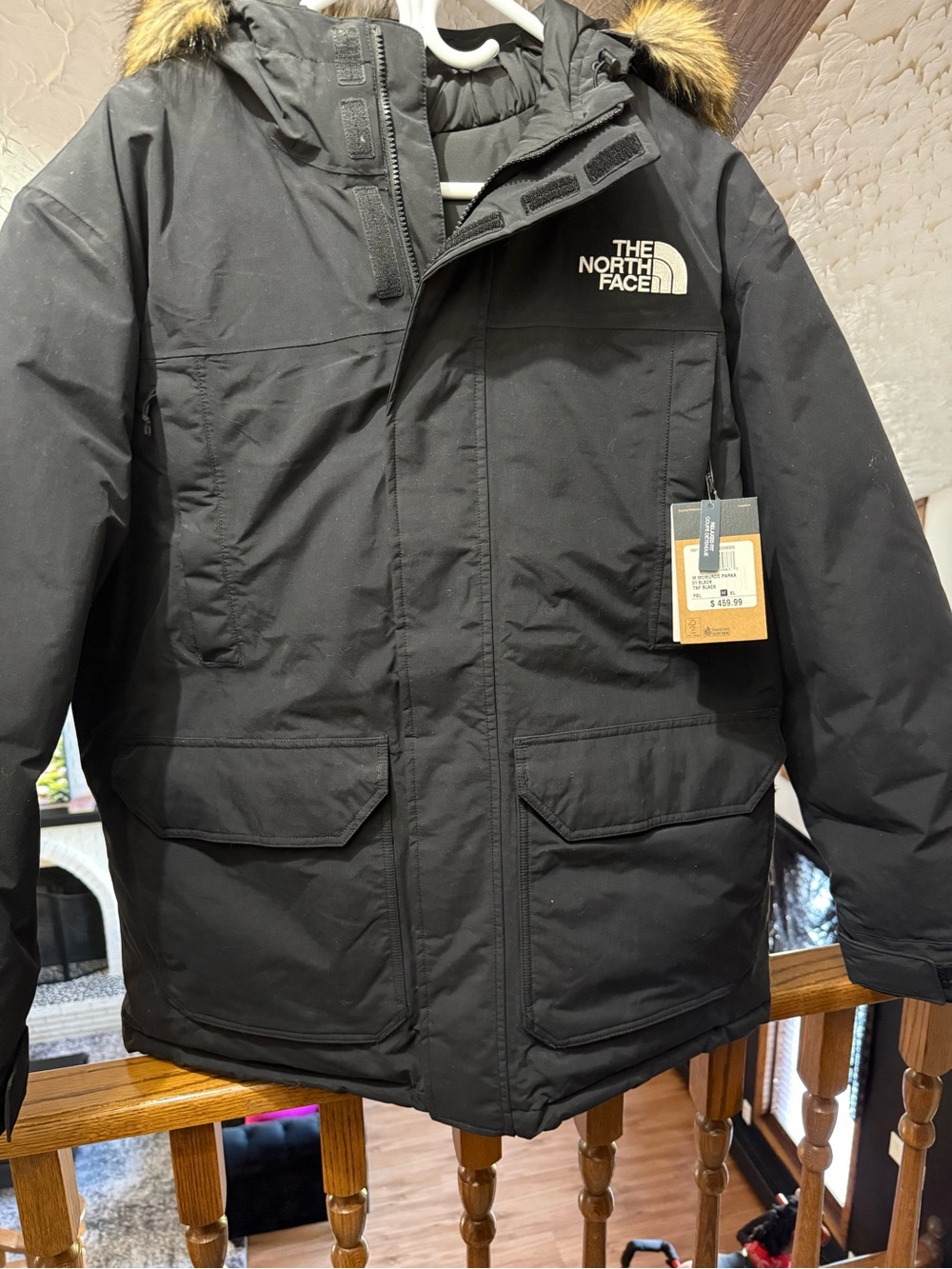 The North Face Men’s Black Hooded Puffer Jacket with Faux Fur Trim